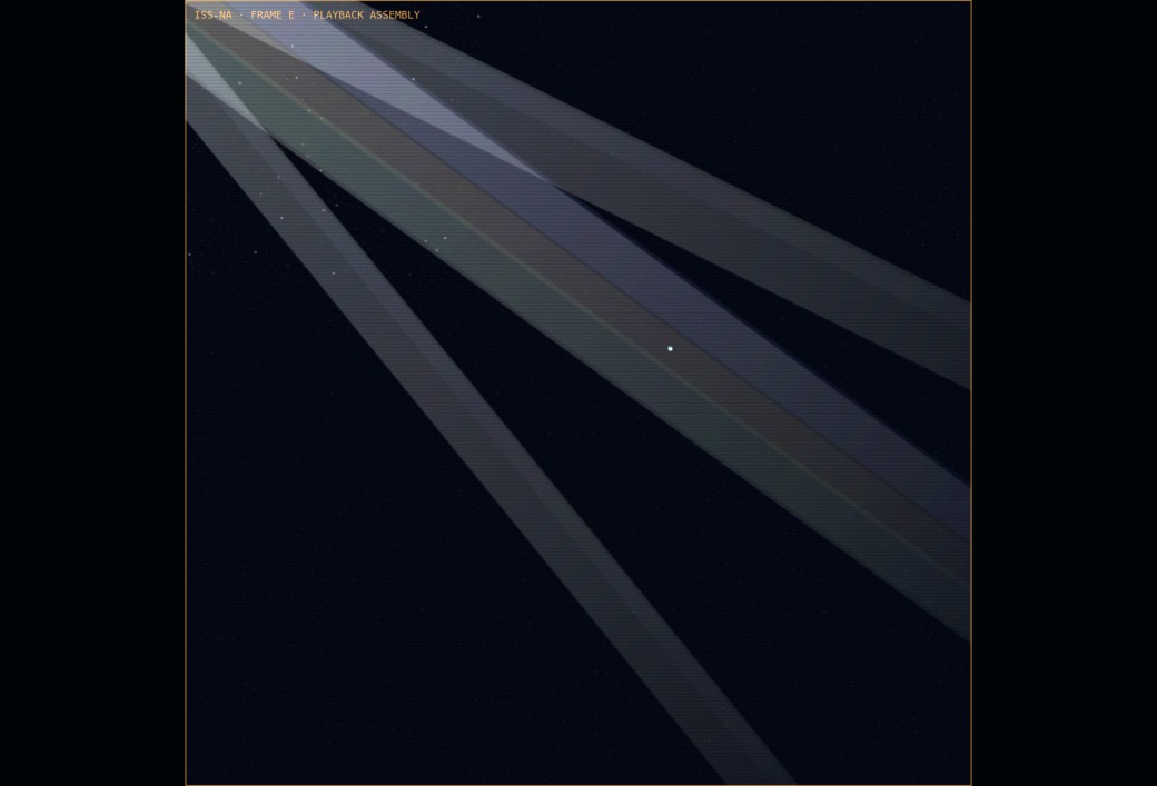 A noisy image assembling line by line on a monitor